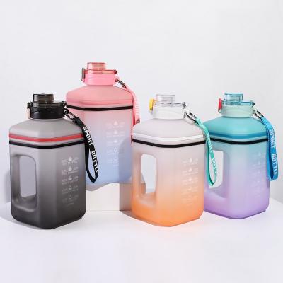 China Custom stocked gradient 2.2L bpa free portable gym water jug ​​petg bottle sports water bottle with handle for sale