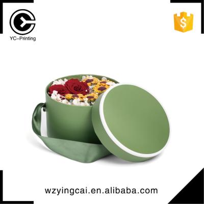 China Recycled Materials Cardboard Low Price Elegant Flora Flowers Round Hat Box With Ribbon Handle for sale