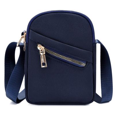 China Fashion Summer Canvas Nylon Cross - Body Bag Lightweight Mini Cell Phone Sling Bag for sale