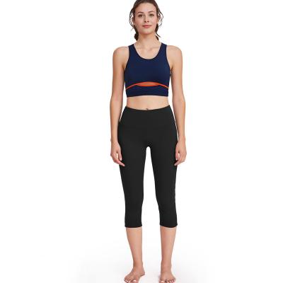 Chine Le yoga courant de femmes de pantalon de yoga de polyester a placé l'ensemble de guêtres de forme physique de séance d'entraînement à vendre