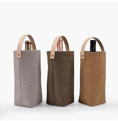 China Custom Eco-friendly Handled Logo Washable Kraft Paper Gift Bag Kraft Paper Bottle Wine Bag for sale