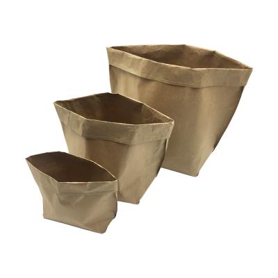 China Biodegradable Custom Printed Non Washable Kraft Paper Storage Bucket Kraft Paper Office Bag for sale