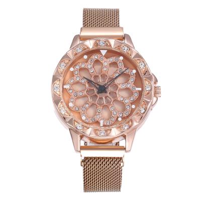 China Rose Gold Color Best Selling Stopwatch Women's Crystal Watch Mesh Belt Rotate Flower Dial Female Wristwatches for sale