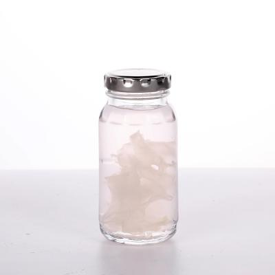 China Empty CANDY 100g New Design Bird's Nest Glass Packaging Bottle With Metal Lid for sale