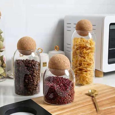 China 2021 Factory Customized Ball Stocked Cork High Borosilicate Glass Transparent Sealed Pot Household Kitchen Food Tea Storage Jar for sale