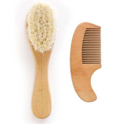 China Waterproof Eco-Friendly Natural Soft Goat Stiffens Wooden Material Mini Newborn Care Baby Brush And Comb Set for sale