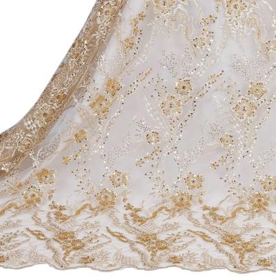 China Other Latest Designs French Gold Tulle Embroidered Beaded With Bling Luxury Flowers Lace Fabric For Dress Dress for sale