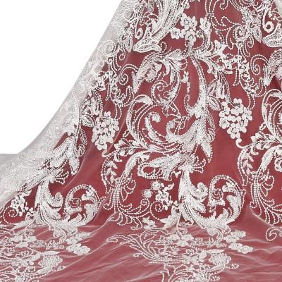 China Other Embroidery Fancy Swiss Heavy Beaded Sequin Feather Design Fabrics Bridal Beaded Laces for sale