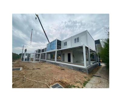 China Beautiful Container Flat Pack Sandwich Panel Prefab Modern Steel Movable Modular Prefab Container House for sale