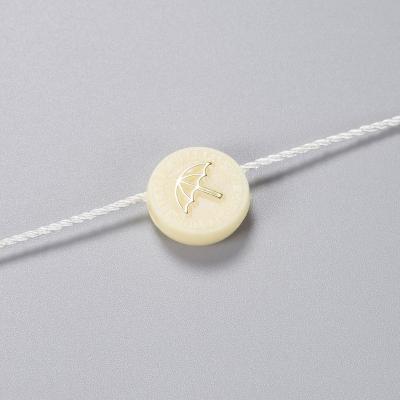 China Custom Hang Tag Viable Hang Tag String Cotton String Logo Emboss Garment Wax Loop for sale