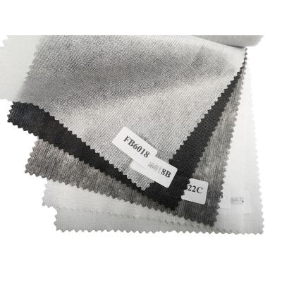 China Embroidered GAOXIN Non-Woven Fabric Garment Adhesive Dot Interlining Width 150cm for sale