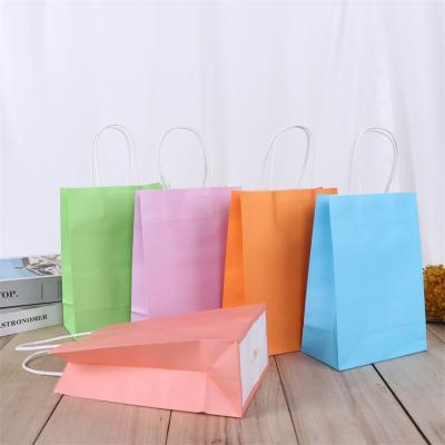 China Wholesale Recyclable Red Recycled Custom Kraft Paper Bag With Logo Twisted Paper Handle Food Packaging Paper Shopping Bag With Handle for sale