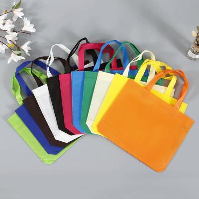 China Large Canvas Hot Reusable Colorful Cotton Nonwoven Fabric Heat Seal Bag Nonwoven Bag With Handles for sale