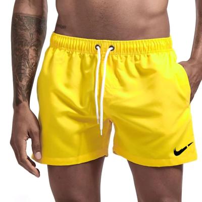 China Custom Logo Men's Anti-wrinkle Summer Beach Wear Quick Dry Swim Shorts Swim Trunks For Men Mens White Shorts for sale