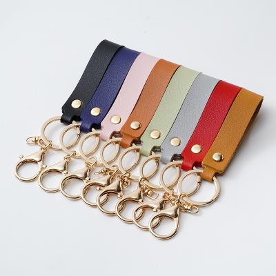 China Men Engraved Leather Keychain With Rings Iron Pu Leather Keyring for sale