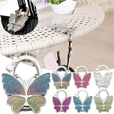 China Tisch Schmetterling Handtasche Hanger Haken Klappbare tragbare für Handtasche zu verkaufen