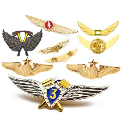 China Custom Design Metal Enamel Pins Badges Gold Plating Engraved Airline Wings Pin Badge For Clothing for sale