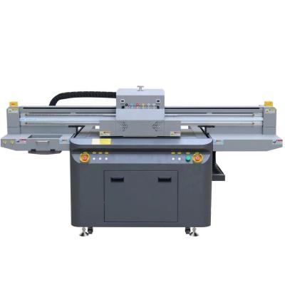 China Garment shops 6 colors inkjet 6090 a1 digital uv flatbed printer price with vacuum tabletop water cooling system for sale