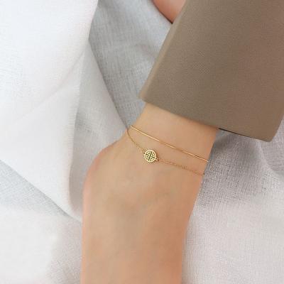 China Never Fade Stainless Steel Jewelry Snake Chain Double Layer Gold Plated Anklets With Chinese Blessing Charm for sale