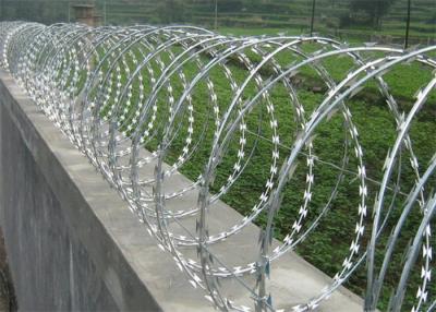 China Galvanized Concertina Razor Barbed Wire BTO22 Razor Fencing Wire for sale