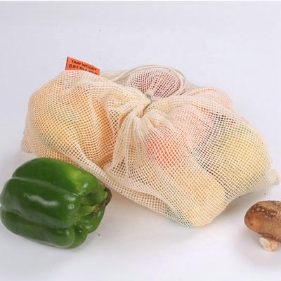 China Eco-Friendly Kitchen Fruit Vegetables Hanging Bag Grocery Product Bags Cotton Mesh Ecology Market String Net Reusable Shopping Bags for sale